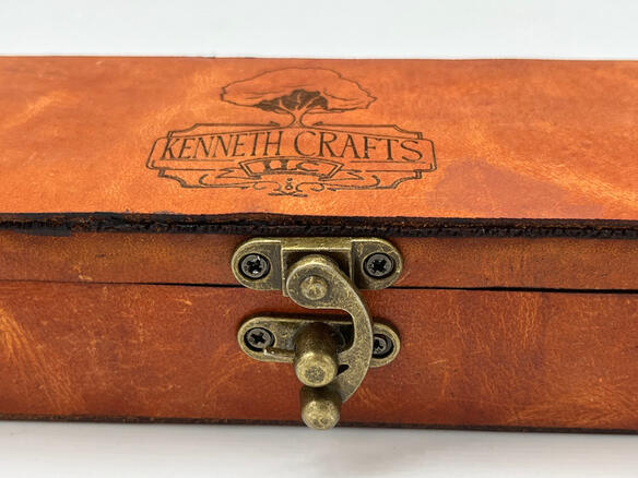2023 | Handmade Feather pen and laser cut box wrapped in leather (2/3) Note: "Kenneth Crafts LLC" is a fictional company in the capstone worldbuilding project.